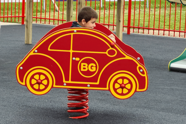 Child playing on Playground Equipment Spring Rider