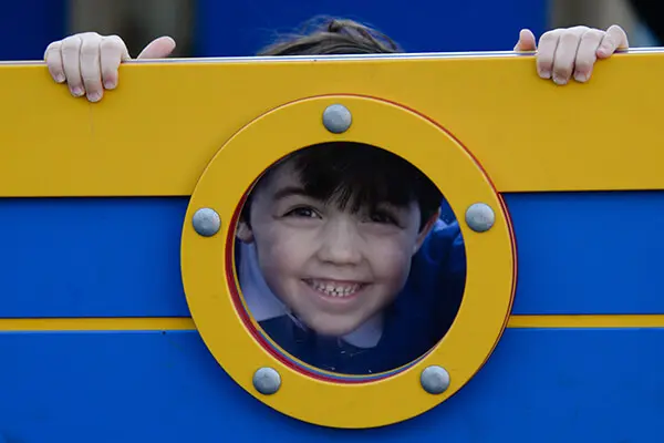 Child smiling and playing