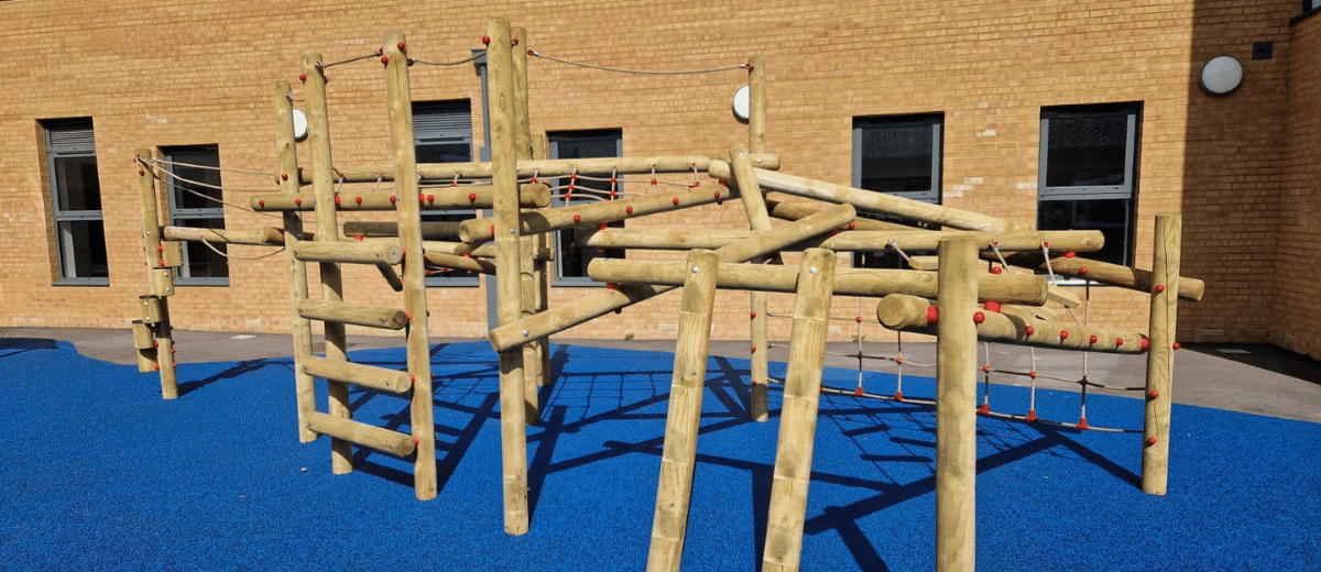 Outdoor Play Jungle Climber into wetpour at primary school