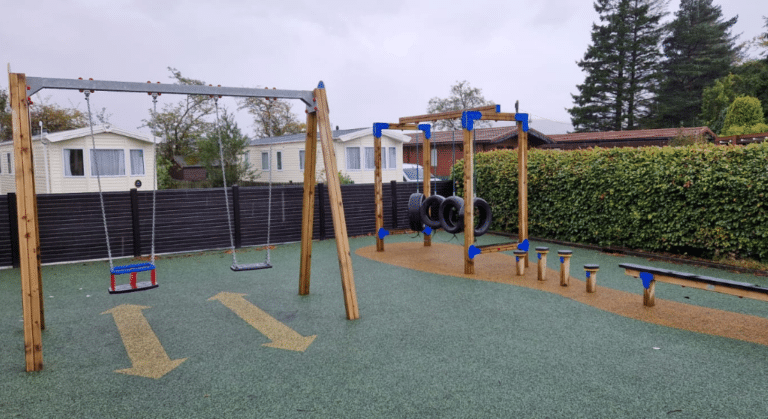 Double Swing Combi And Trim Trail Playground Equipment With Wetpour Safety Surfacing