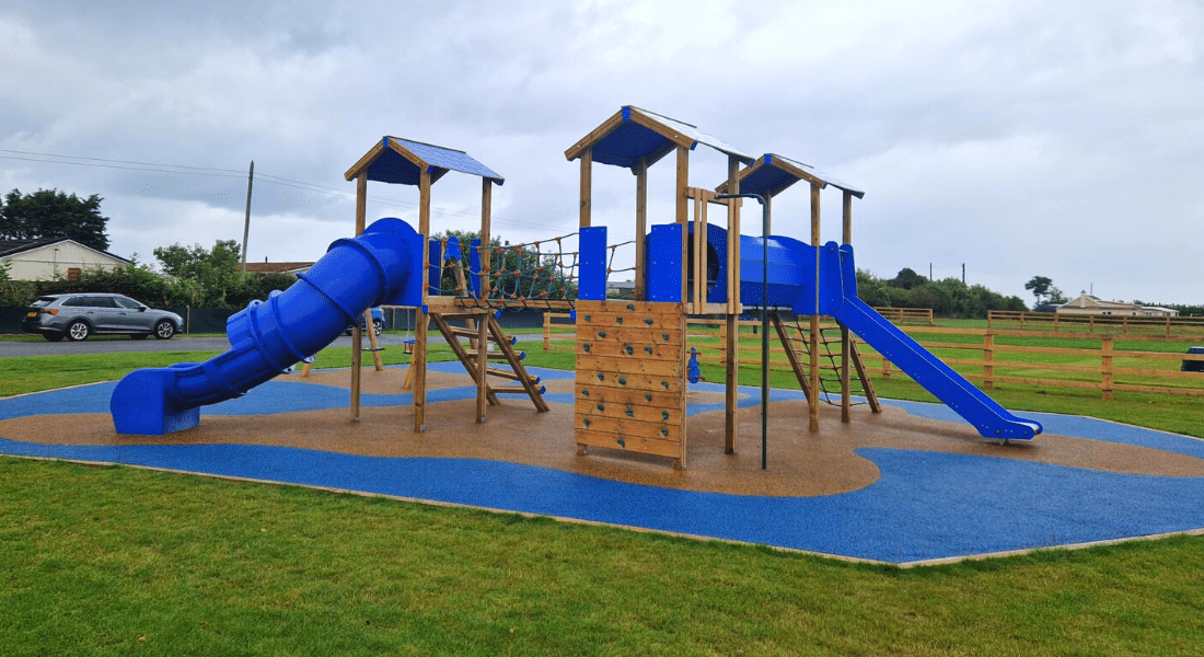 Bespoke Jigsaw Tower, Dog Spring Rider, Motorbike Spring Rider, Double Swing Combi Playground Equipment, And Wetpour Safety Surfacing.