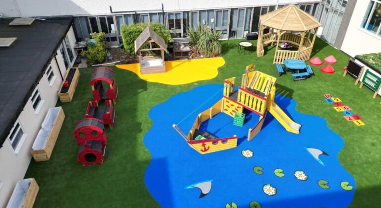 Pictured is a drone shot of Moor House School and College with a OCTAVIA (4M WITHOUT FLOOR), PLANTER 3M X 0.50M, MINI TRAIN (RED PLASTIC), TIMBER PLAYHOUSE – CONSTRUCTION SITE,