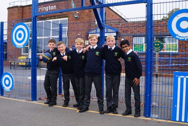 Education Sector Blog - This image shows a children playing on playground equipment