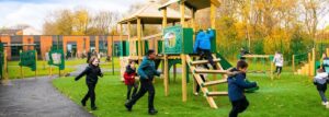 This image shows children from Prospect House in Manchester enjoying their bespoke inclusive jigsaw tower