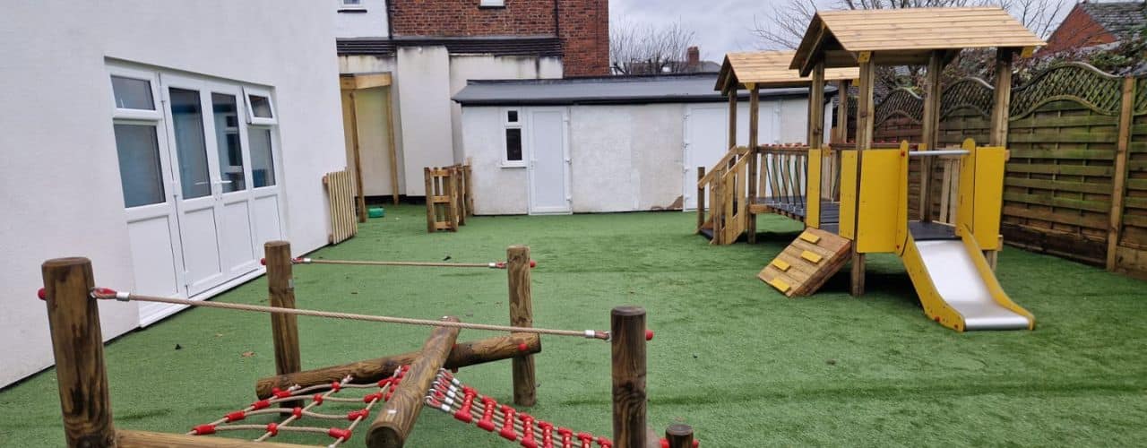 This image shows the completed early years playground at the Davyhulme Road Nursery School by Creative Play