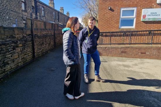 This image shows our Outdoor Play Expert Ryan on a site visit