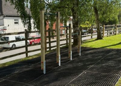 This image shows a pull up bars playground equipment installed at Uffculme Parish Council in Tiverton