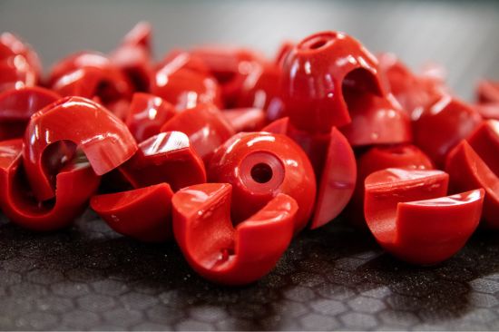 This image shows plastic red playtech replacement play equipment parts