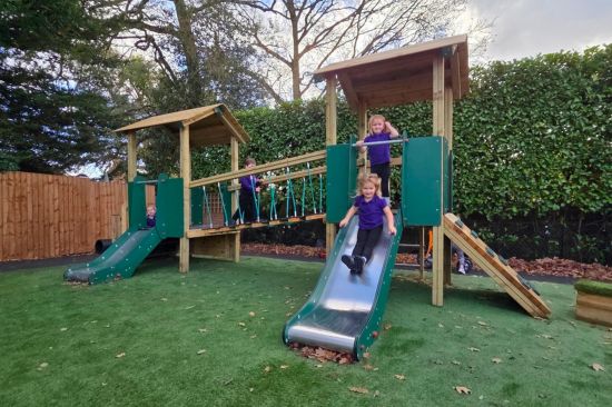 New Website Imagery - Playground Design Resource (4) This image shows junior school pupils playing on a play tower
