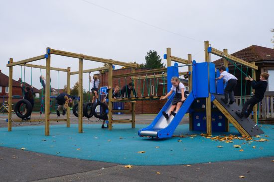 New Website Imagery - KS1 & KS2 (6) This image shows primary school pupils playing on playground equipment