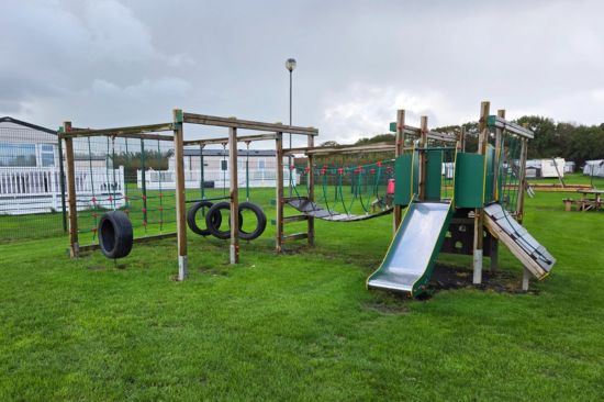 This image shows an activity centre playground equipment in a caravan park in the UK 