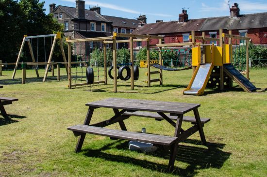 This image shows a playground in a local pub beer garden