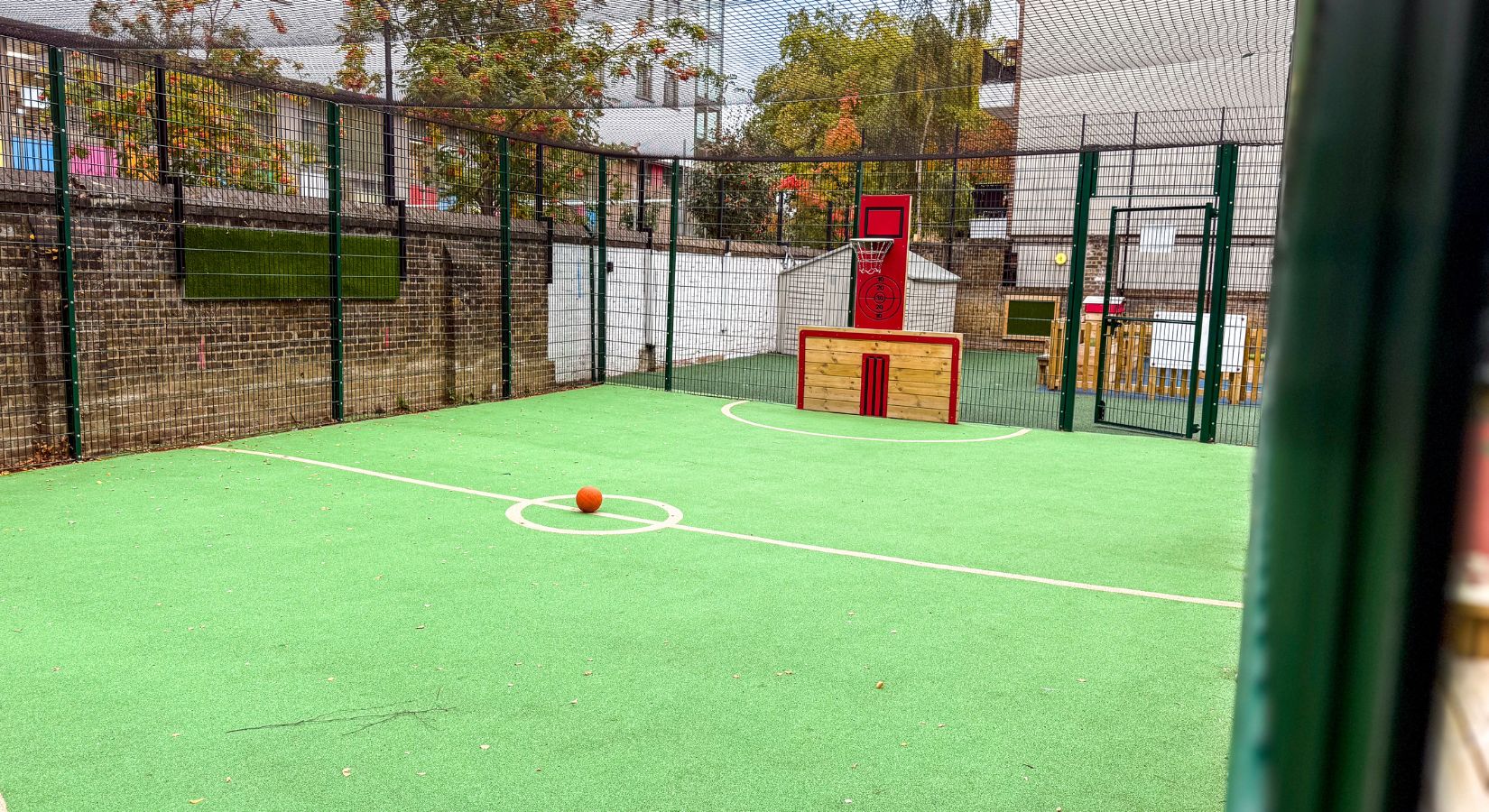 Games pitch surrounded by fencing