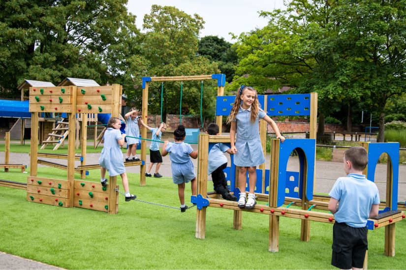 New Website Imagery - Education Sector (1) This image shows primary school children playing on school playground equipment
