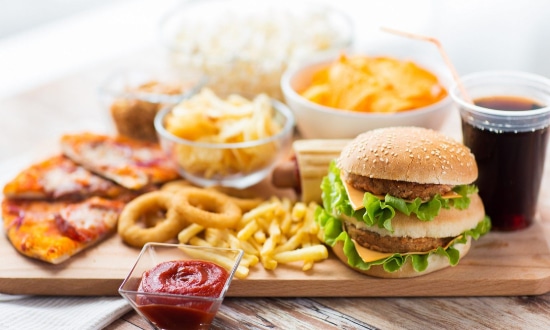 A feast of junk food laid out on a table