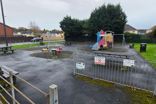 This image shows the playground at Ammanford Town Council before the playground project
