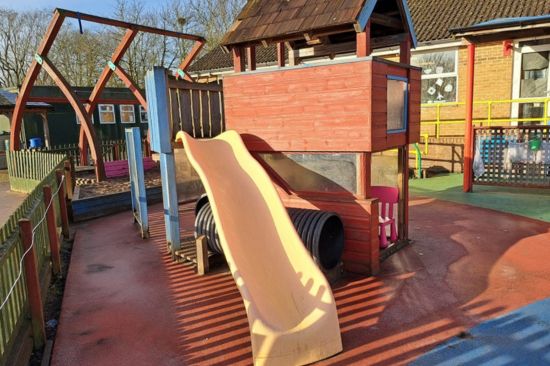 This image shows the before of the playground at St Gilbert's 