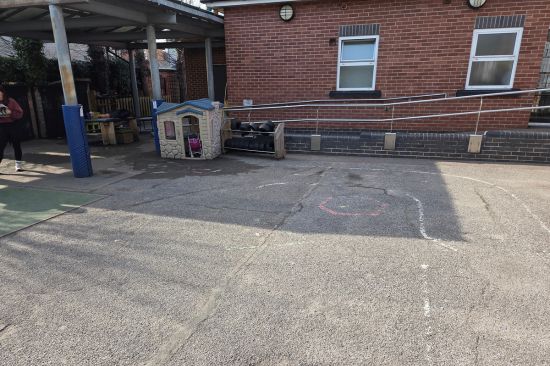 This image shows the playground at Heathfield Primary and Nursery School before the playground project took place